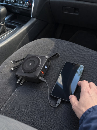 The ECDF power bank charging a phone in a car
