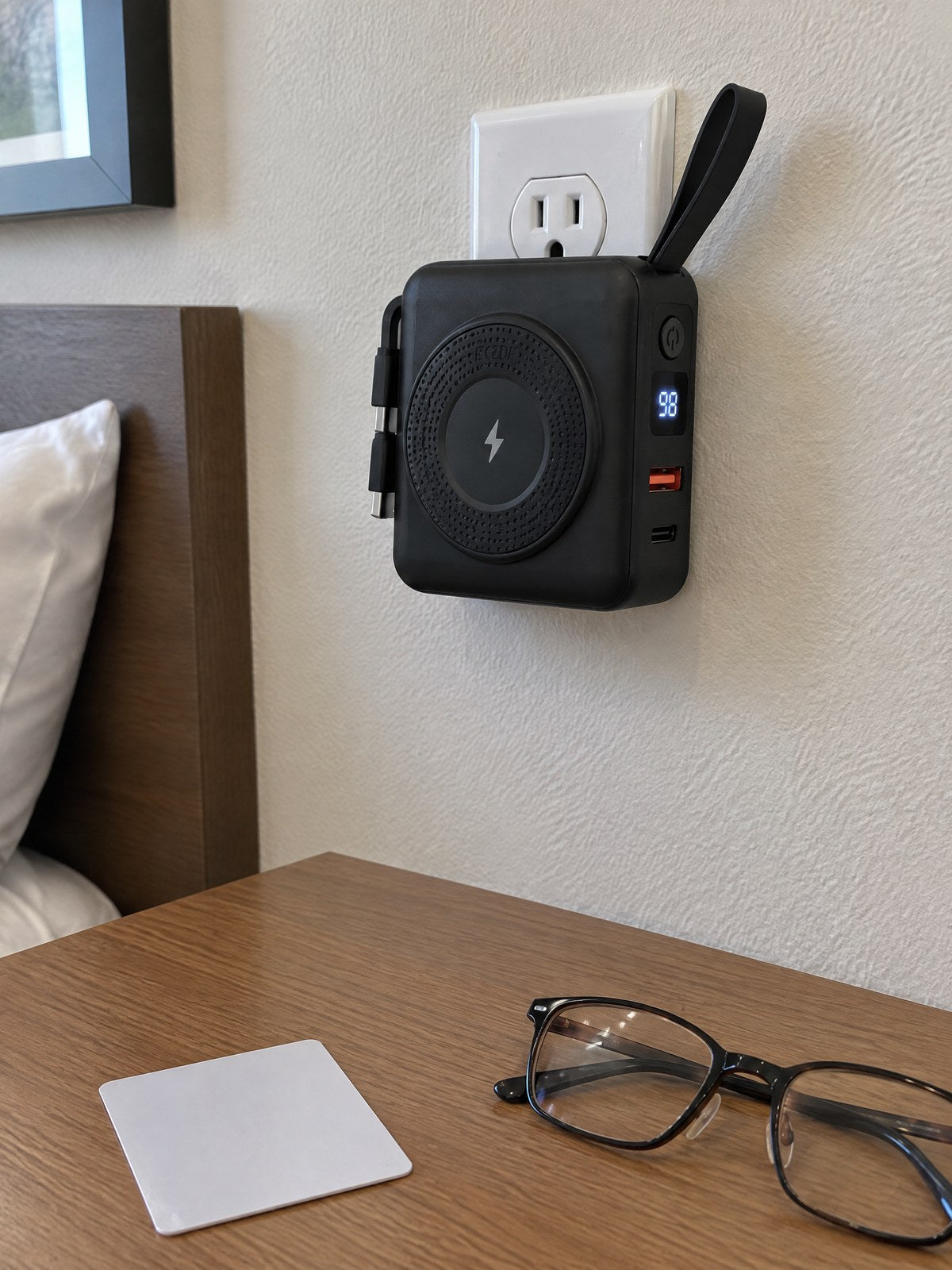 The ECDF power bank plugged straight into a wall outlet by its foldable plug