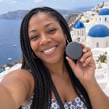 Selfie in Santorini with the ECDF translator held up to the camera