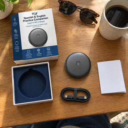 What comes in the box, laid out on a table: the ECDF translator, its box, the USB-C cable and the quick-start card