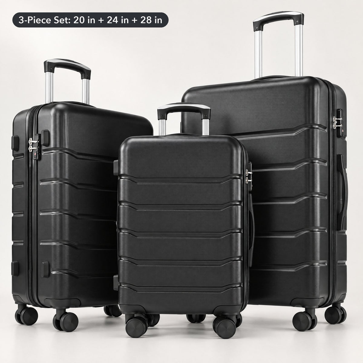 Black 3-piece hardside spinner luggage set: 20 in, 24 in and 28 in cases with telescoping handles raised