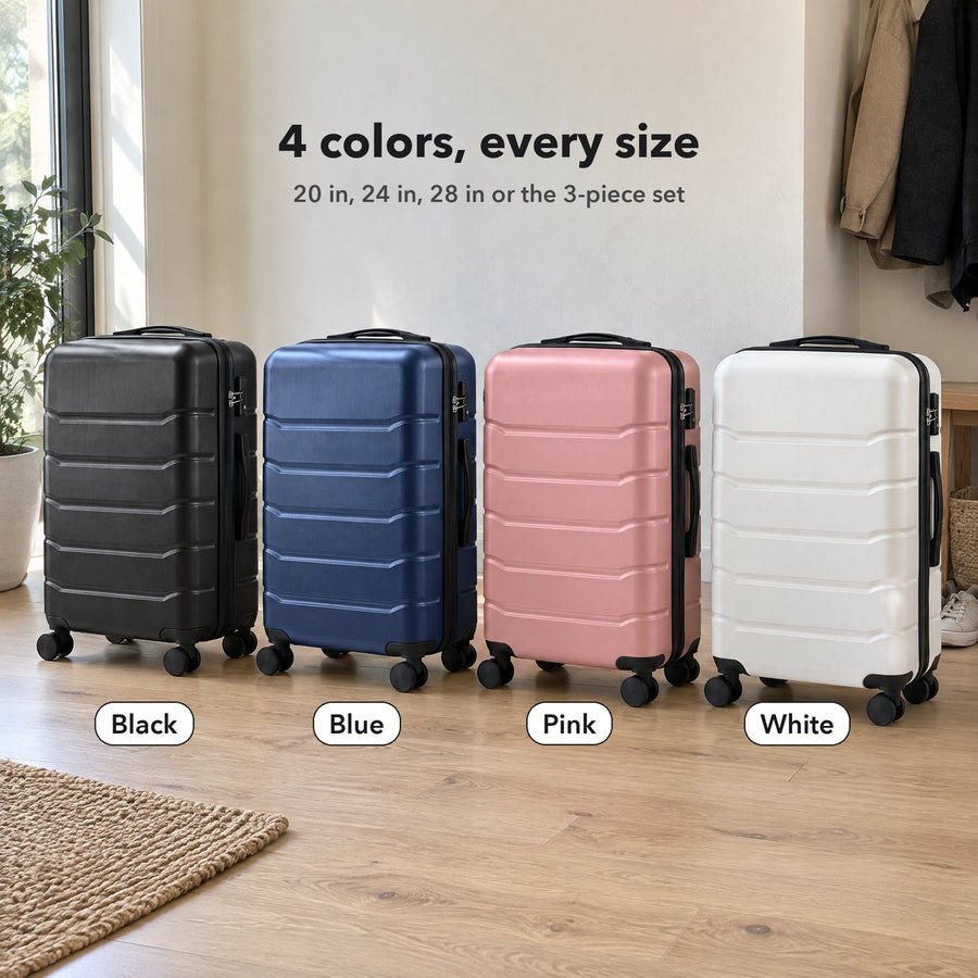 The hardside spinner suitcase in its four colors side by side: black, blue, pink and white