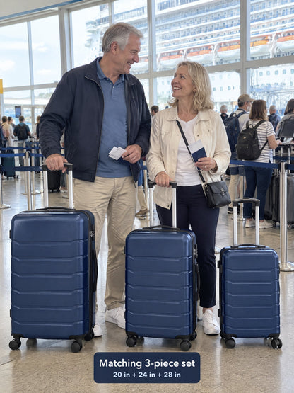 A couple in their sixties at a cruise terminal check-in with the blue 3-piece set